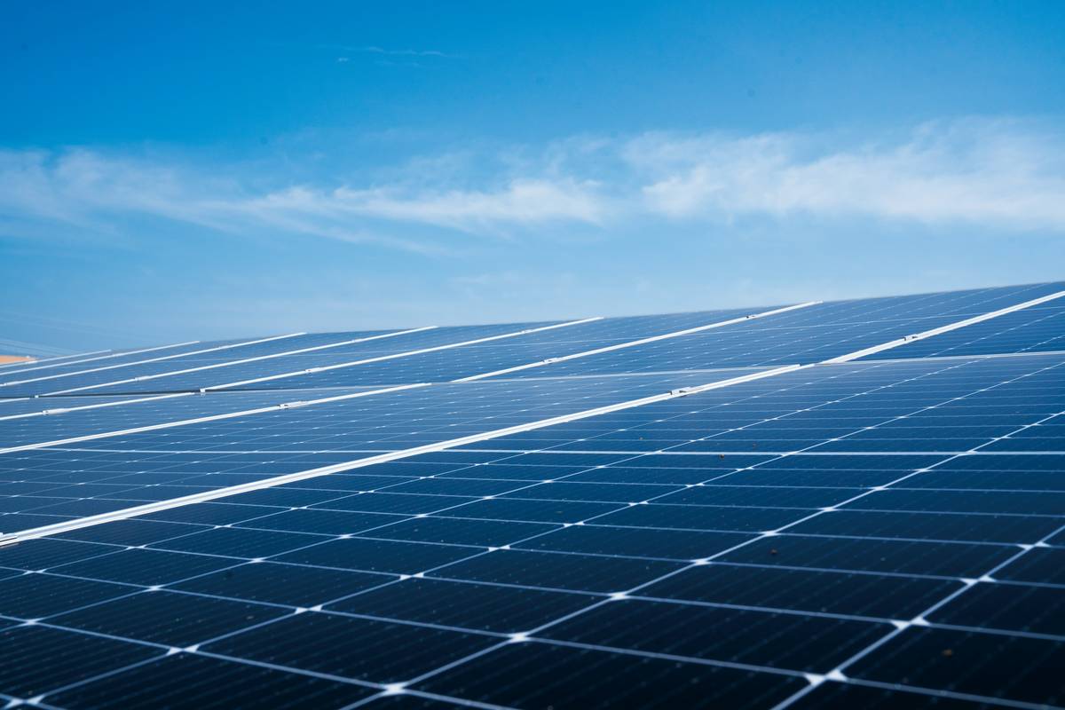 Solar panels for commercial use installed on business parking lot canopy structure